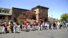 Customers gather by the hundreds outside a Chick-fil-A restaurant in Fairfield, Calif., on Wednesday, Aug. 1, 2012. (AP / The Vacaville Reporter, Joel Rosenbaum) 