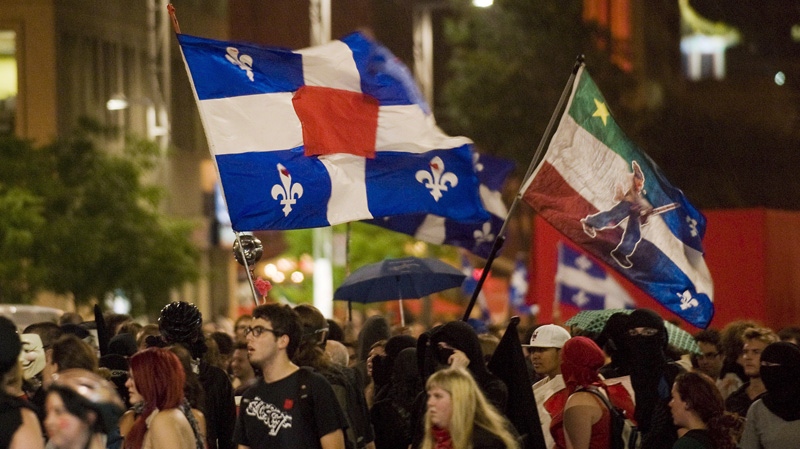 Protesters march in Montreal on day one of the Quebec provincial election, Aug. 1, 2012.