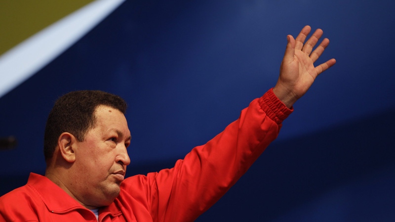 Venezuela's President Hugo Chavez waves to supporters in Caracas on Aug. 3, 2012.