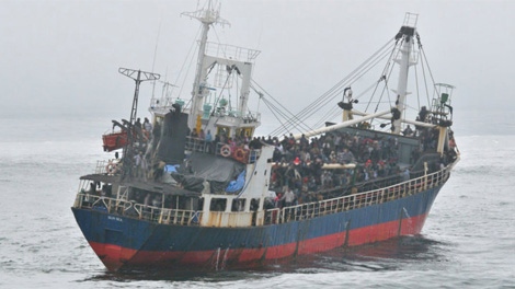 A terrorism expert says Canada will become known as a safe haven for criminals and terrorists unless the government takes a strong stance dealing with a ship carrying 490 migrants that arrived in B.C. Friday morning. August 13, 2010. (Maritime Forces Pacific / Facebook)
