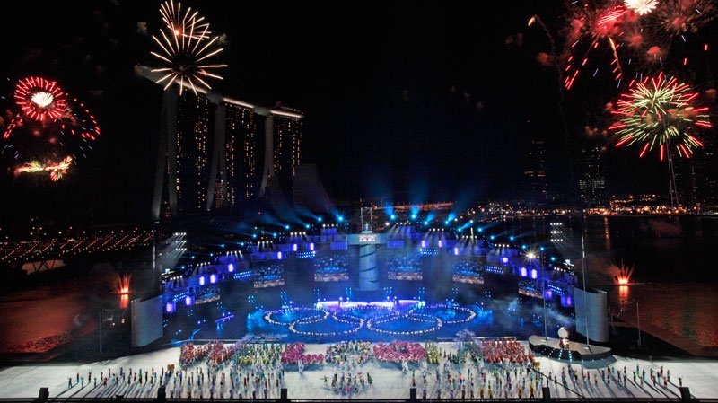 Fireworks explode over the opening ceremony marking the start of the inaugural Youth Olympic Games in Singapore, on Saturday, Aug. 14, 2010. (AP / Wong Maye-E)