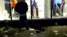Toronto police are investigating after a video of a man peeing on another man who appears to be homeless surfaced on the Internet on Tuesday, Aug. 7, 2012.