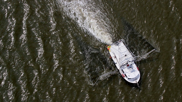 A shrimp boat sails on Barataria Bay on the coast of Louisiana, Monday, Aug. 16, 2010. (AP / Patrick Semansky)