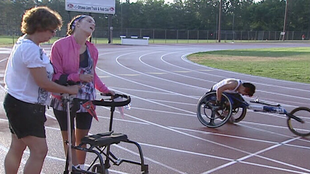 Jody Graham walks the track at the Terry Fox Athletic Facility Wednesday, Aug. 8, 2012.
