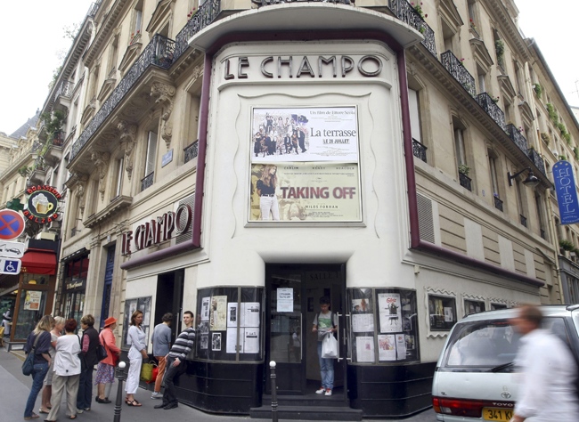 This July 27, 2010 photo shows the Champo theatre in Paris. In Paris, there are seemingly endless rues and quais and museums and cafes to explore, which means visitors often hurry past one of the city's greatest attractions: its cinemas. (AP / Jacques Brinon) 