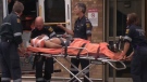 The 19-year-old victim of a shooting in the city's east end is seen being transported to hospital by EMS, Friday, Aug. 10, 2012.