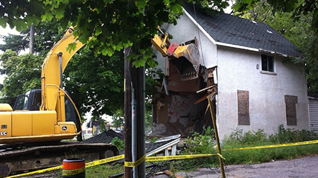 City demolishes abandoned home on Maplewood Ave. long considered an eyesore August 13, 2012. 