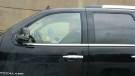 A Twitter photo of Mayor Rob Ford reading papers while driving on the Gardiner Expressway (Twitter photo)