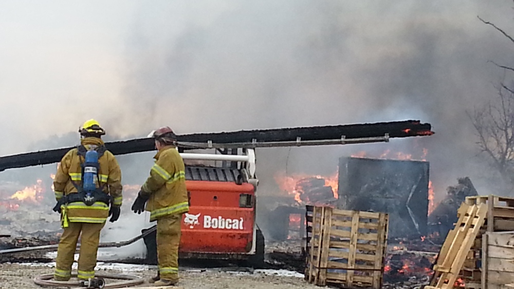 Crews battle a fire that destroyed an outbuilding on a rural property just south of Regina on Tuesda