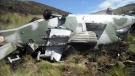 This photo taken Tuesday, Aug. 14, 2012 shows one of three Ugandan military helicopters that crashed on Mount Kenya, Africa’s second-highest peak, on Sunday. (AP Photo)