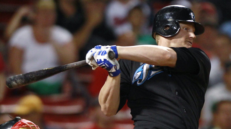 Toronto Blue Jays' Lyle Overbay watches his RBI-single in the eighth inning against the Boston Red Sox during their baseball game in Boston, Friday Aug. 20, 2010. (AP Photo/Charles Krupa)