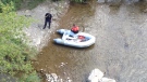 Police search the shores of the Credit River after the discovery of human hands in Mississauga, Ont., on Friday, Aug. 17, 2012. (Cristina Tenaglia / CTV News)
