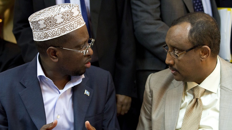 Somalia President Sharif Sheikh Ahmed, left, speaks with PM Abdiweli Mohamed Ali on Aug. 4, 2012.
