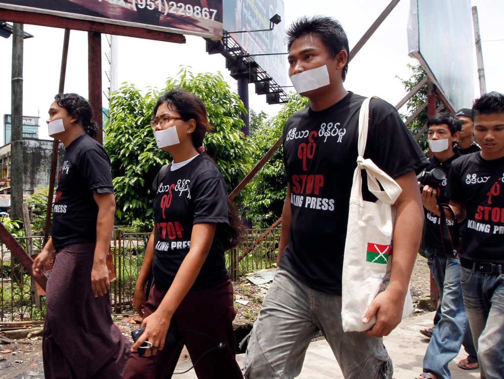 Journalists walk to collect signatures in Yangon, Myanmar.  (AP Photo/Khin Maung Win)