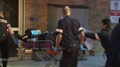 One of two shooting victims from 46 Cather Cres. is wheeled into hospital on Tuesday, Aug. 25, 2010.