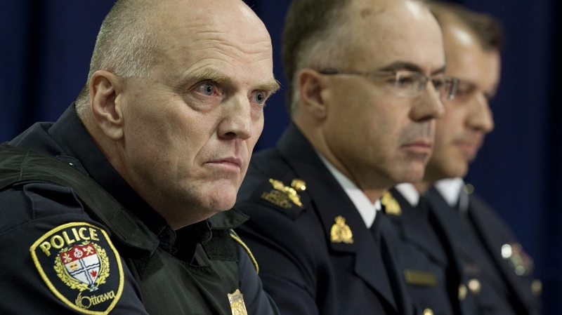 RCMP Chief Superintendant Serge Therriault, Officer in Charge of A Division (right to left), RCMP Assistant Commissioner Francois Bidal, Commanding Officer of A Divison and Ottawa Police Chief Vern White listen to a question as they discuss the arrests of three terror suspects during a news conference in Ottawa, Thursday, Aug. 26, 2010. (Adrian Wyld / THE CANADIAN PRESS)  