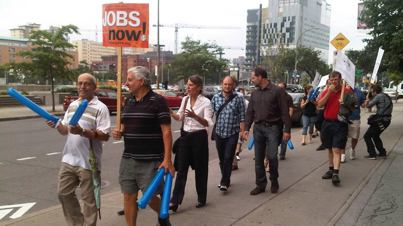 Former Aveos Fleet Performance employees protest outside a courthouse in Montreal on Aug. 14, 2012.