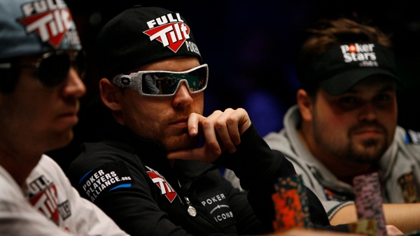 John Racener, left, Matthew Jarvis, and Jason Senti play a hand during the World Series of Poker in Las Vegas on Saturday, July 17, 2010. (AP Photo/Laura Rauch)