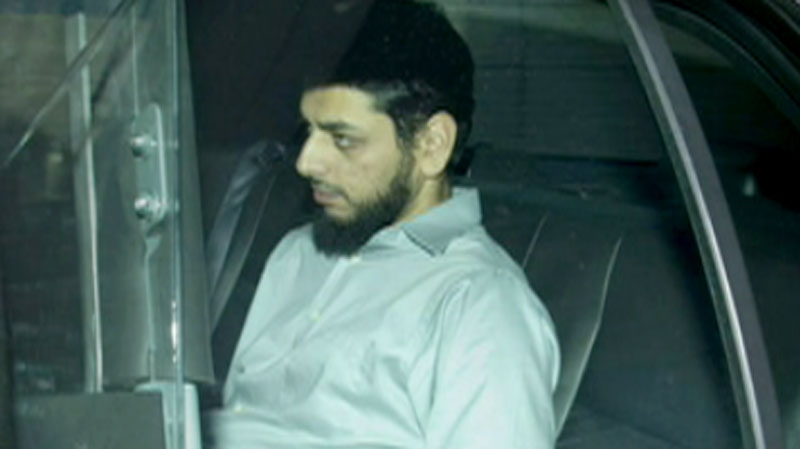 Khurram Syed Sher is transported from a courthouse by federal security officials in Ottawa, Friday, Aug. 27, 2010. (Image courtesy of Ottawa Citizen)