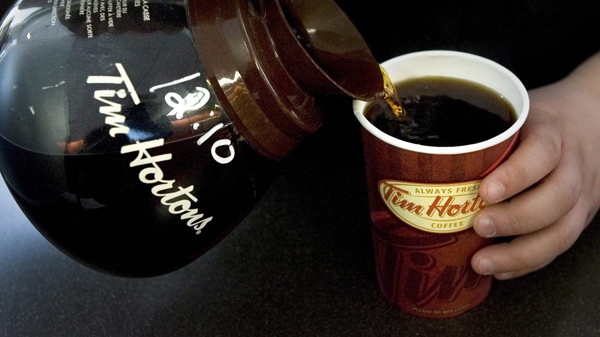 A cup of Tim Hortons coffee is poured in Toronto on Friday, May 14, 2010. (Chris Young / THE CANADIAN PRESS)  