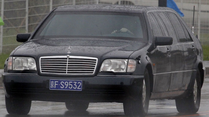 A limousine with tinted windows believed to be carrying North Korean leader Kim Jong Il leaves from an agriculture exposition in Changchun, northeastern China Jilin province on Saturday, Aug. 28, 2010. (AP Photo/Ng Han Guan)