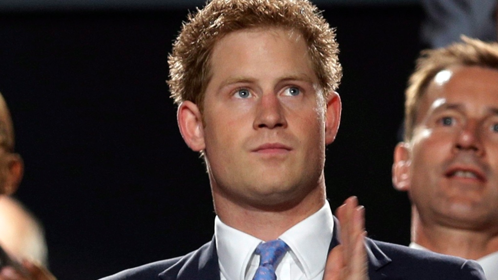 Prince Harry applauds during the Closing Ceremony at the 2012 Summer Olympics, Sunday, Aug. 12, 2012