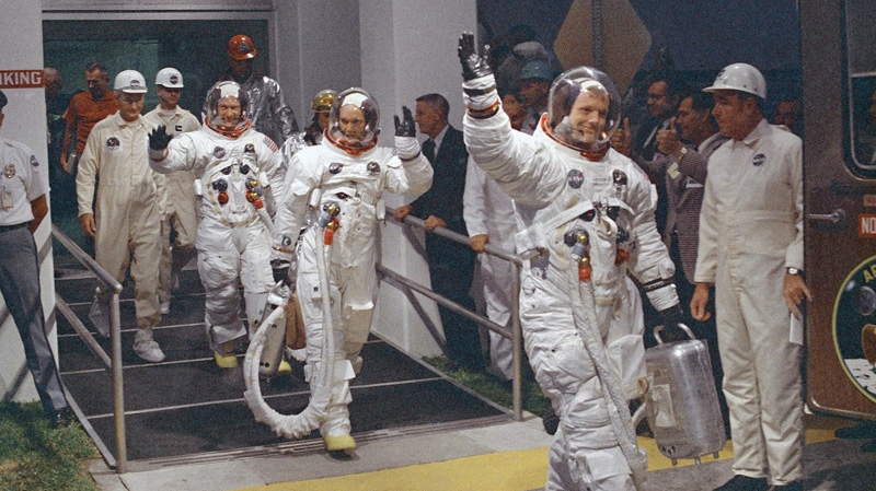 In this July 16, 1969 file photo, Neil Armstrong leads the crew at Kennedy Space Center in Florida.