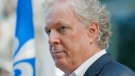 Former Quebec Premier Jean Charest speaks to reporters during an election campaign stop in Saint-Bruno, Que., Saturday, Aug. 25, 2012. (Graham Hughes / THE CANADIAN PRESS)