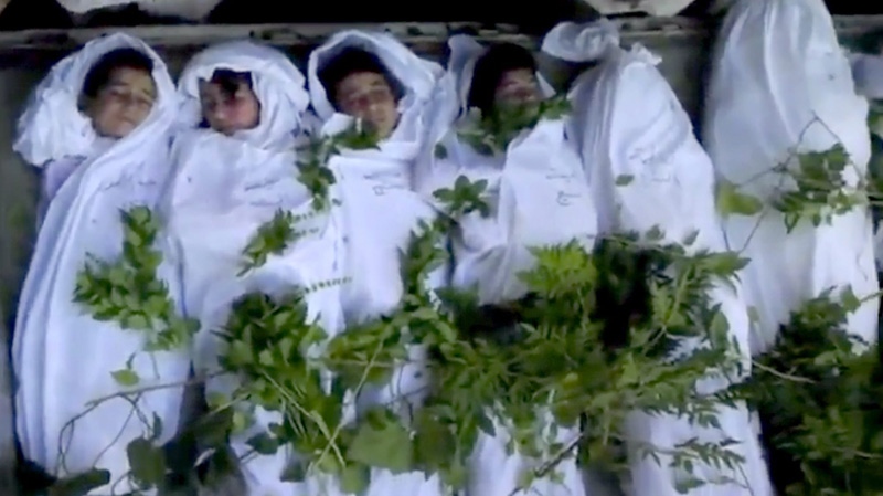 Unverified Aug. 23, 2012 image from video purports to show the funeral of children in Daraya, Syria