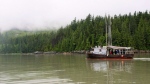 The Suncrest, a 42 foot former commercial fishing boat passes the site of the proposed Enbridge Northern Gateway bitumen terminal on Douglas Channel, south of Kitimat, B.C., on Wednesday, June 27, 2012. THE CANADIAN PRESS/Robin Rowland