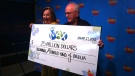 Susannah and Ron Higgs celebrate their Lotto Max $25-million jackpot win in Toronto on Monday, Aug. 27, 2012. (Scott Lightfoot/CTV Toronto)