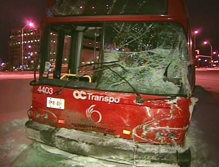 The OC Transpo bus is seen with a smashed windshield after it collided with an SUV in Ottawa on Wednesday, Jan. 23, 2008.