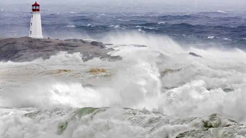 Waves from Hurricane Earl pound the coast at Peggys Cove, N.S. on Saturday, Sept. 4, 2010. (Andrew Vaughan / THE CANADIAN PRESS).