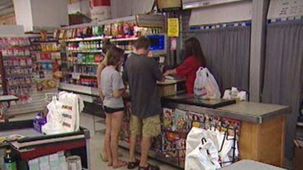 Shoppers visit the Food Fare on Portage Avenue in Winnipeg Sunday.