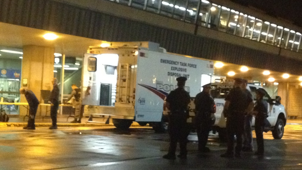 Police investigate a suspicious package found at Kennedy Station