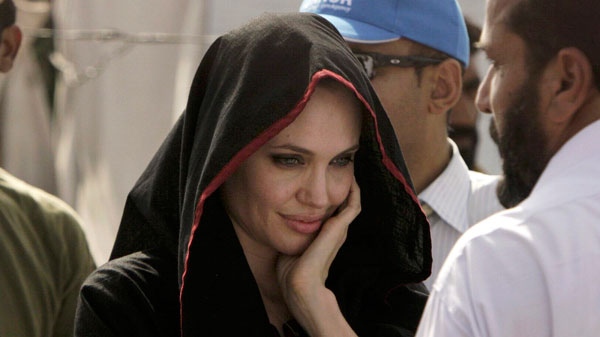 Hollywood actress and the goodwill ambassador of UNHCR, Angelina Jolie visits a camp setup for people displaced by heavy floods, in Mohib Banda near Peshawar, Pakistan on Tuesday, Sept. 7, 2010. (AP / Mohammad Sajjad)