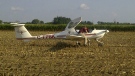 A pilot of a small plane made an emergency landing in a west-Ottawa field after running into engine problems Sept. 5, 2012. 