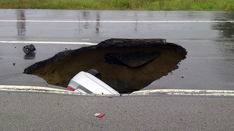 Car swallowed by sinkhole