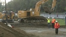 City crews work to repair massive sinkhole on Highway 174 in city's east end. 