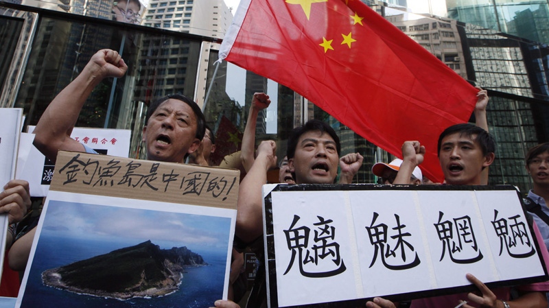 Protesting Japan's claim to the islands outside the Japanese Consulate in Hong Kong on Sept. 11 2012