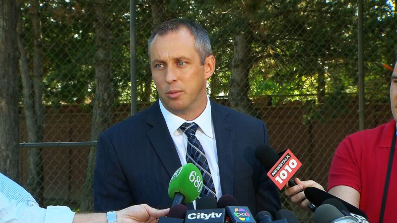 Toronto police Homicide Det. Sgt. Brett Nicol holds a press conference in Toronto on Tuesday, Sept. 11, 2012.