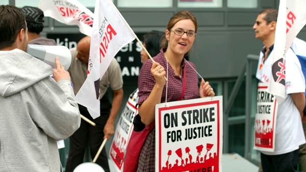 Supporters of the striking unionized hotel workers are seen during the Lightbox opening festivities on Sunday, Sept. 12, 2010. (Josh Visser/CTV.ca)