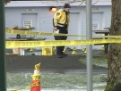 Police investigate the scene where a teen was stabbed to death in Grays Park, located near Fraser Street and East 33rd Avenue in east Vancouver.