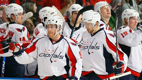 Washington Capitals right winger Eric Fehr, front right,and teammate Brendan Morrison (9) celebrate after Fehr scored a second-period goal against the Tampa Bay Lightning during an NHL hockey game Tuesday, Jan. 12, 2010, in Tampa, Fla. (AP Photo/Chris O'Meara) 
