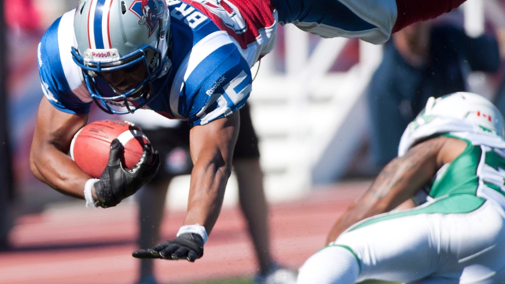 Montreal Alouettes' Brian Bratton dives for a touchdown during first half CFL football action agains