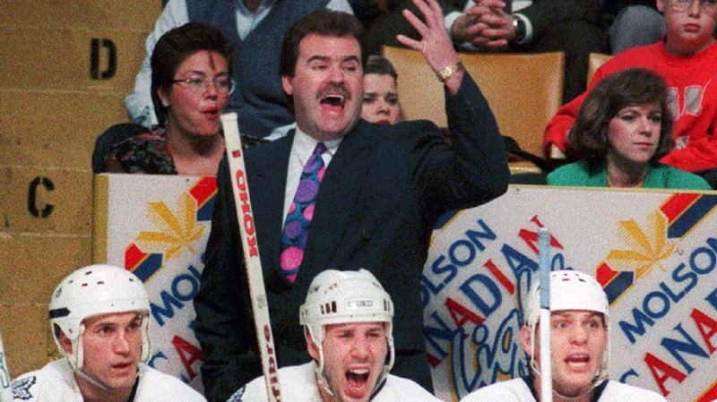 Then-Toronto Maple Leafs' head coach Pat Burns yells out instructions to his players on the ice during the second period of an NHL game against the Los Angeles Kings in Toronto on March 31, 1993. (THE CANADIAN PRESS) 