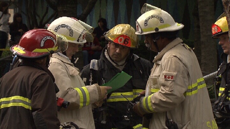 Vancouver firefighters respond to a potentially dangerous chemical reaction at an office building in the 900-block of Nelson Street. Sept. 19, 2010. (CTV)