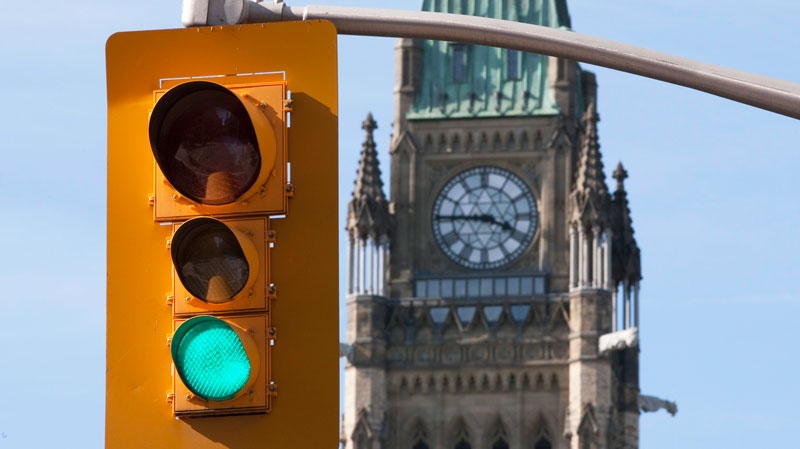 A traffic light indicates traffic can proceed near Parliament Hill in Ottawa, Sunday Sept 19, 2010. (Adrian Wyld / THE CANADIAN PRESS)