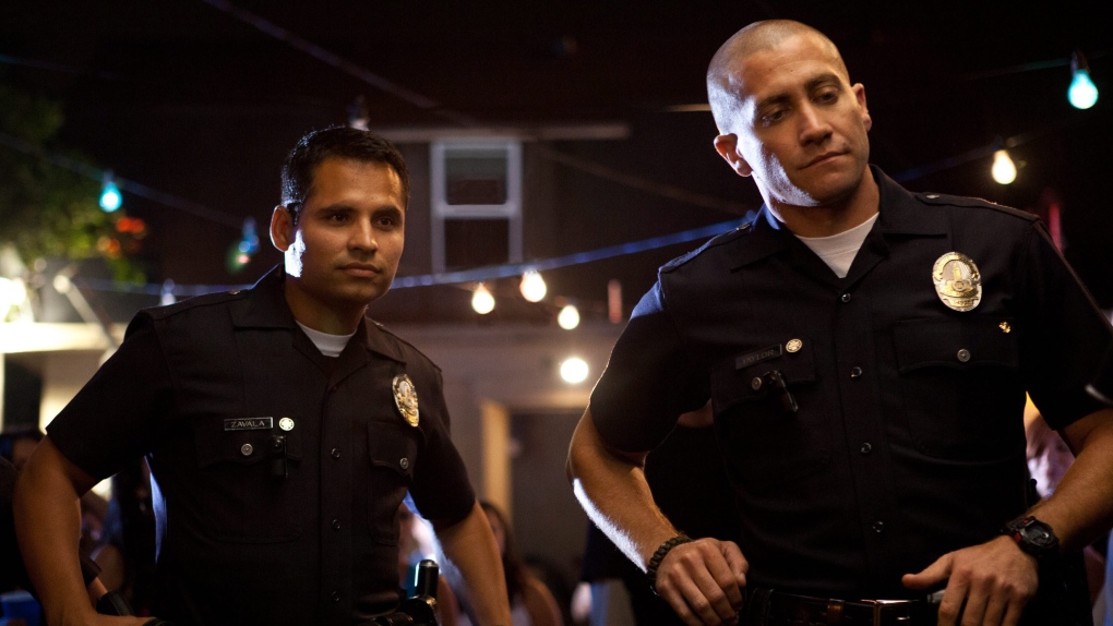 Michael Pena, left, and Jake Gyllenhaal in a scene from VVS Films' 'End of Watch.'