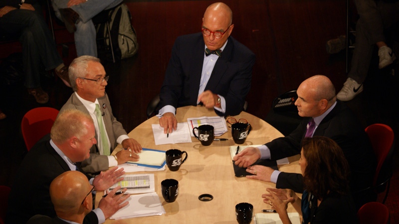Moderator Stephen LeDrew, top, sits down with the leading mayoral candidates during a CP24 debate on Tuesday, Sept. 21, 2010. Clockwise from Ledrew are George Smitherman, Sarah Thomson, Rocco Rossi, Rob Ford and Joe Pantalone. (Shannon Gallagher / CTV.ca)